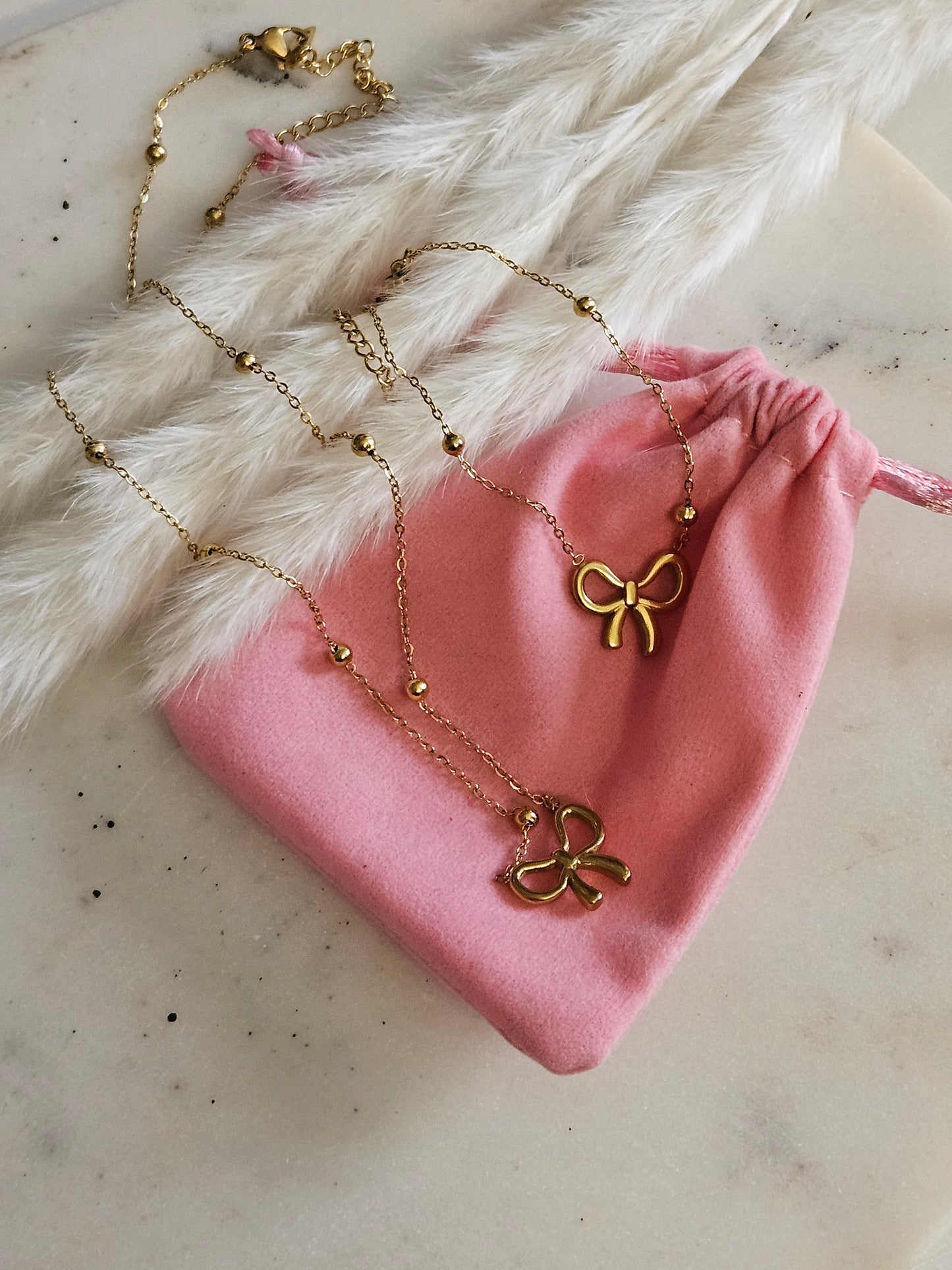 18K Gold, Stainless Steel Bow Necklace Set.